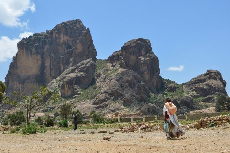 A woman heads to the border town of Senafe where the shops are now filled with biscuits and other items made in Ethiopia