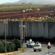UN peacekeepers patrol the border wall separating Lebanon from Israel on December 9, 2018, after the Israeli army said it had uncovered Hezbollah infiltration tunnels underneath
