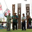 Former president of French Polynesia Oscar Temaru (L) speaks during a 2014 ceremony at a memorial dedicated to nuclear test victims in Papeete
