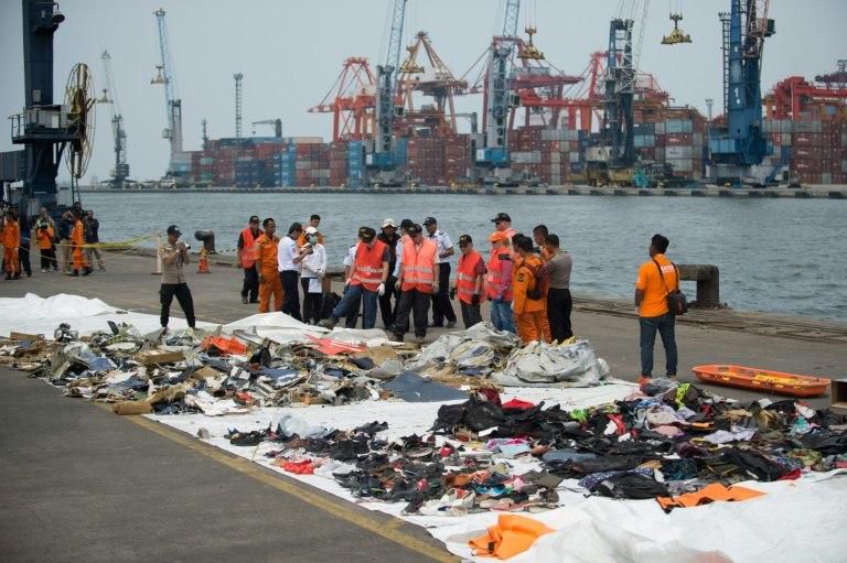 Officials from Boeing and the US National Transportation Safety Board joined the Indonesian team sifting through twisted metal plane parts and a pile of personal effects plucked from the sea