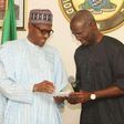 President Muhammadu Buhari (left) and former Lagos State Governor, Babatunde Fashola.