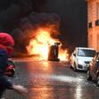 A car burns on Paris's famous Champs-Elysees avenue as the French capital is hit by another round of "yellow vest" protests on Saturday