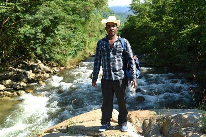 Honduran migrant Jorge Almendarez, 39, poses as he travels in a caravan heading to the US, in Pijijiapan, Chiapas state, Mexico