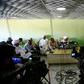 Idris Suleiman (C), Sudan's ex-minister of international cooperation and political secretary of the Popular Congress Party, speaks during a press conference at the party's headquarters in the capital Khartoum on December 26, 2018