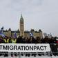 Right-wing protesters rally against the UN international pact on migration at Parliament Hill in Ottawa