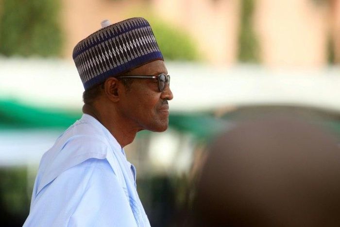 Nigeria's President Muhammadu Buhari, pictured October 1, 2018, expressed concern that Nigerians were too frequently resorting to violence over misunderstandings after fighting broke out in a market following a dispute among wheelbarrow porters
