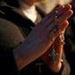 Christian pilgrims pray inside the grotto where Jesus is believed to have been born at the Church of the Nativity in Bethlehem on December 24, 2018