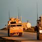 US Marine Corps tactical vehicles are seen near the Syrian town of Tal Baydar in northeastern Hasakeh province on December 21, 2018