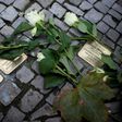 In recent years across Germany on November 9, people have polished brass plaques embedded in pavements bearing the names of Jewish victims