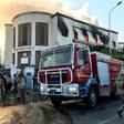A firetruck and security officers at the scene of an attack on the Libyan foreign ministry in Tripoli on December 25, 2018