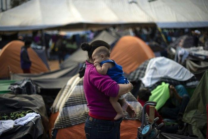 More than 6,000 migrants who travelled to the northern Mexican city of Tijuana by caravan are camped out hoping to apply for asylum or sneak into the United States