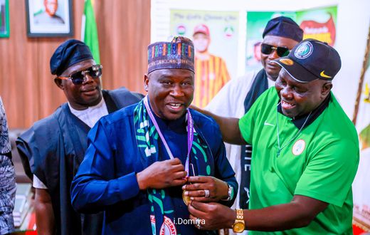 Adamawa State Governor, Ahmadu Fintiri and the coach of the Super Falcons, Justine Madugu.