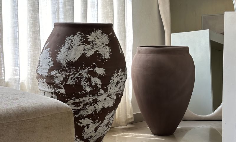 Antique pots by Oriental Effect.
