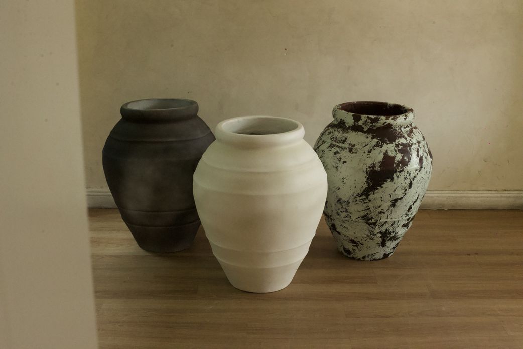 Antique pots by Oriental Effect.