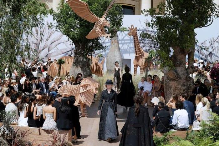Models present creations for Christian Dior during the 2017 fall/winter Haute Couture collection in Paris