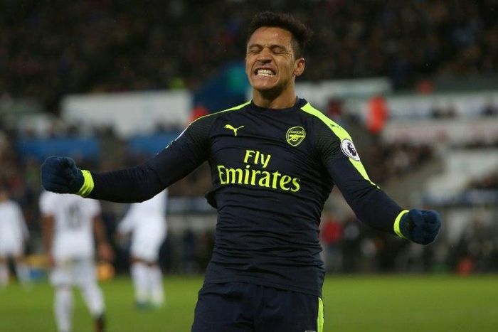 Arsenal's Alexis Sanchez celebrates scoring his team's fourth goal against Swansea on January 14, 2017