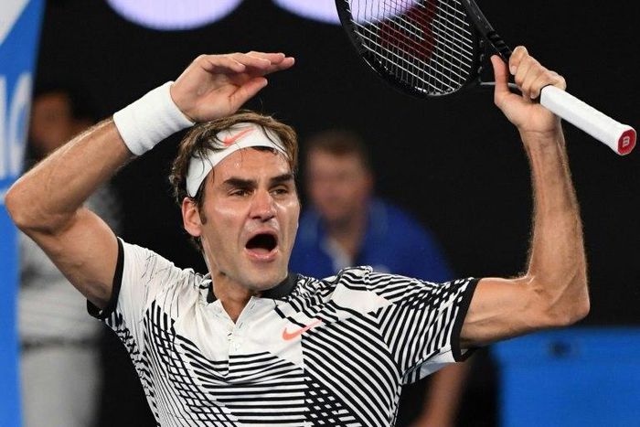 Switzerland's Roger Federer celebrates his victory against Japan's Kei Nishikori after their Australian Open fourth round match, in Melbourne, on January 22, 2017