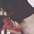 Runtown bonding with his baby