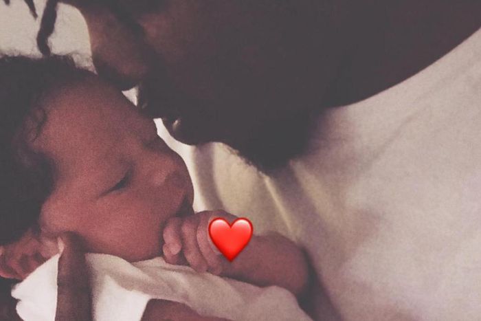 Runtown bonding with his baby