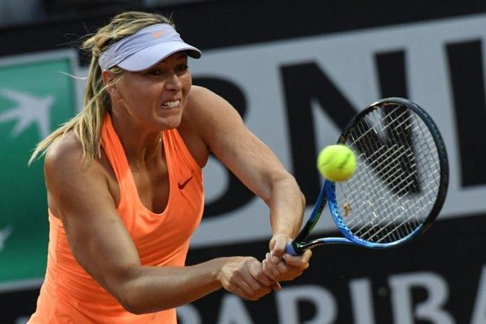Russia's Maria Sharapova returns the ball to Mirjana Lucic-Baroni of Croatia during their tennis match at the ATP Tennis Open tournament on May 16, 2017 at the Foro Italico in Rome