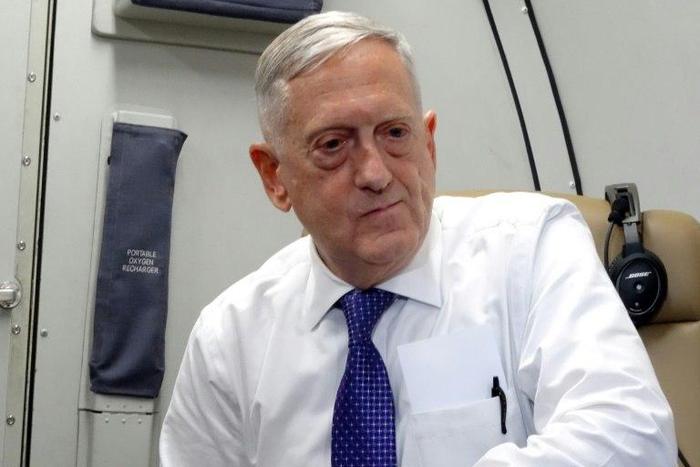 US Defense Secretary James Mattis speaks to reporters on board a flight on August 20, 2017