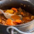 SOUTH AFRICA: Potjiekos is a one-pot dish comprising of meat and vegetables slowly cooked with a Dutch-Malay spice blend. It can be found all across South Africa, including at the Oranjezicht City Farmer's Market in Cape Town.