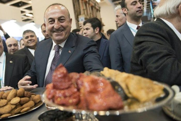 Turkish Foreign Minister Mevlut Cavusoglu is just one of a string of senior officials seeking to win a 'Yes' vote from Turks in Germany in next month's referendum