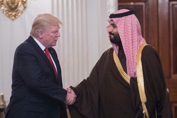 US President Donald Trump and Saudi Deputy Crown Prince and Defense Minister Mohammed bin Salman shake hands in the State Dining Room before lunch at the White House in Washington, DC, on March 14, 2017