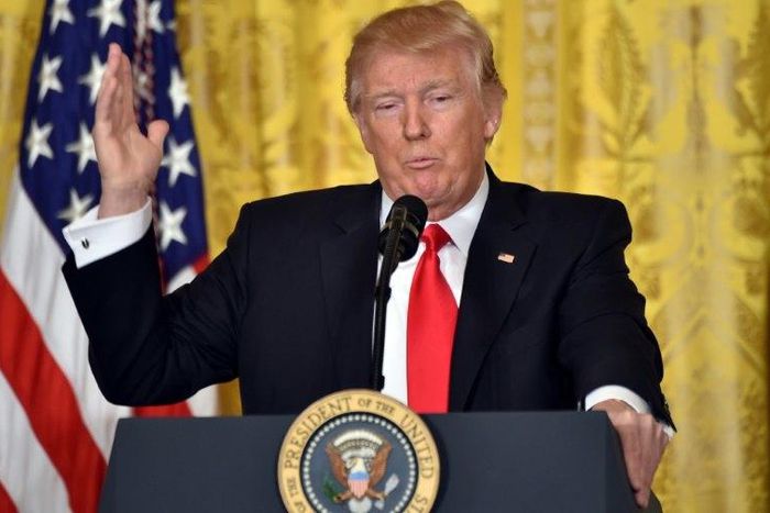 US President Donald Trump vowed to catch "low-life leakers" of potentially classified information that led to the ouster of his national security advisor