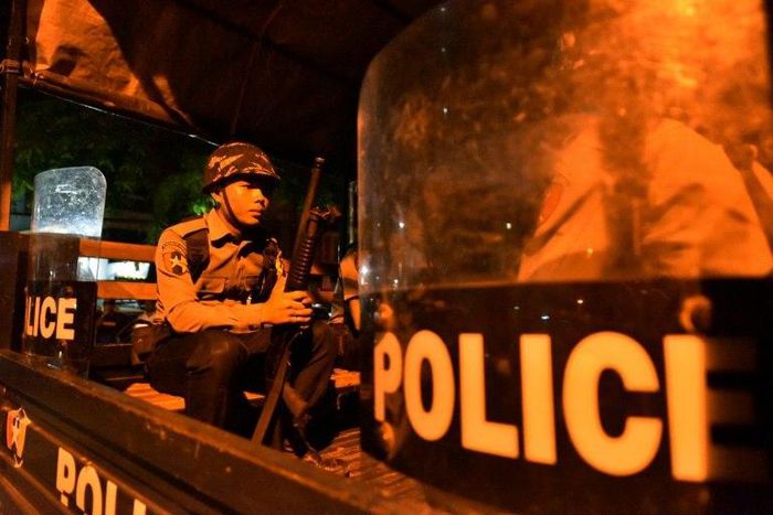 A Myanmar riot policemen patrols the streets of Yangon, on May 10, 2017