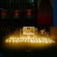 A photograph of Tibetan student Tenzin Choeying on display during a candlelight memorial in New Delhi, on July 23, 2017