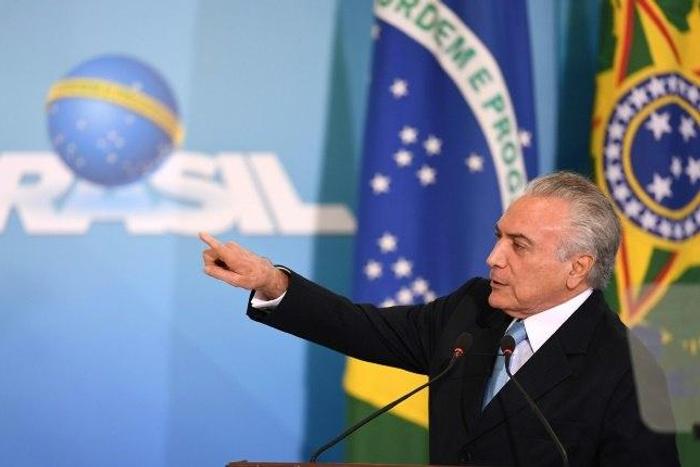 President Michel Temer is hoping improving economic data will give him a lifeline as he tries to fend off a huge corruption scandal