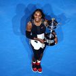 Serena Williams holds the Australian Open trophy.