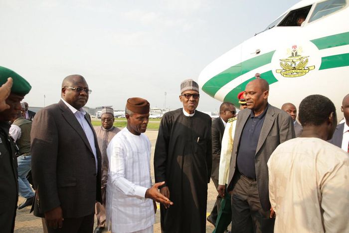 Acting President Yemi Osinbajo welcomes President Muhammadu Buhari