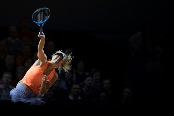 Russia's Maria Sharapova serves to Estonia's Anett Kontaveit during their quarterfinal match at the WTA Porsche Tennis Grand Prix in Stuttgart, southwestern Germany, on April 28, 2017