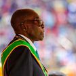 Zimbabwe's President Robert Mugabe reviews the guard of honour during the country's 37th Independence Day celebrations at the National Sports Stadium in Harare April 18, 2017