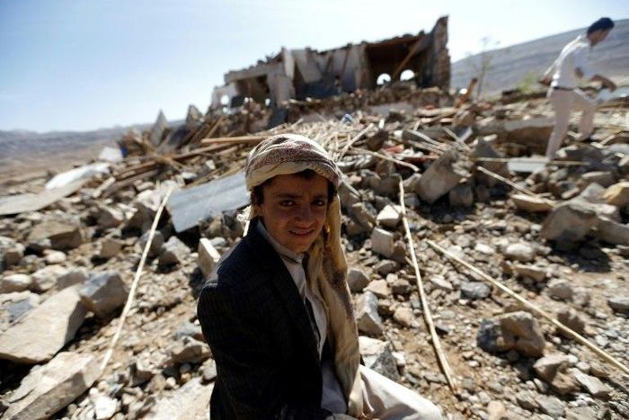 Yemenis check the site of an air raid that hit a funeral reception in the Arhab district, 40 kilometres (25 miles) north of the capital Sanaa, on February 16, 2017.