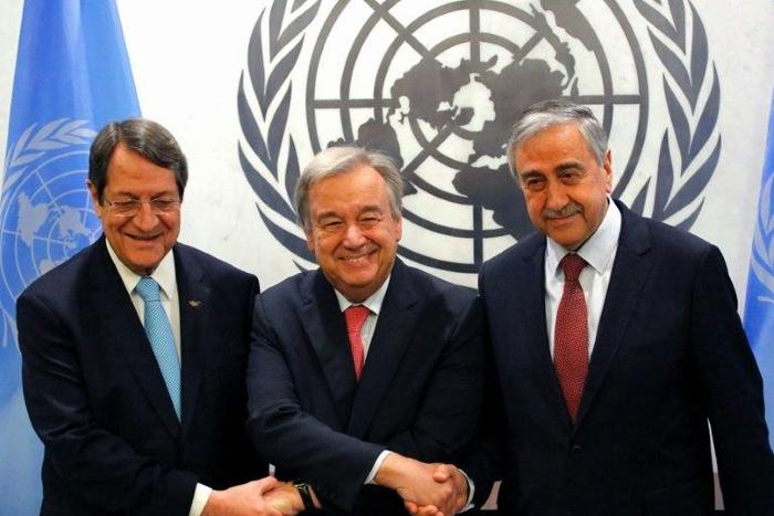UN Secretary-General Antonio Guterres (centre) is flanked by Greek Cypriot leader Nicos Anastasiades (left) and his Turkish Cypriot counterpart Mustafa Akinci ahead of talks at the UN headquarters in New York, on June 4, 2017