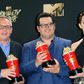 Director Bill Condon (L) and actors Josh Gad (C) and Emma Watson (R), winners of Movie of the Year for 'Beauty and the Beast' at the MTV Movie & TV Awards