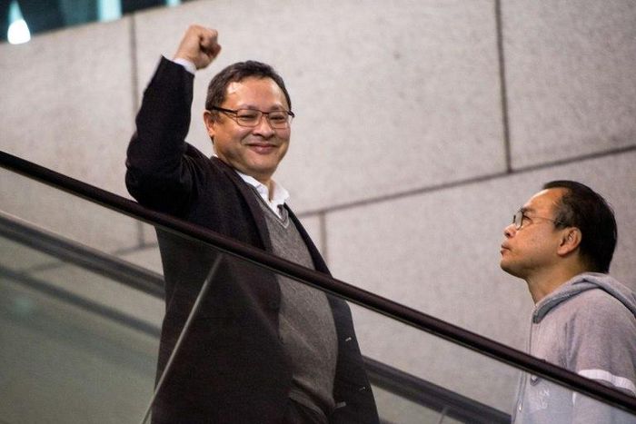 Benny Tai (L) is co-founder of Occupy Central, one of the groups behind the 2014 Umbrella Movement rallies
