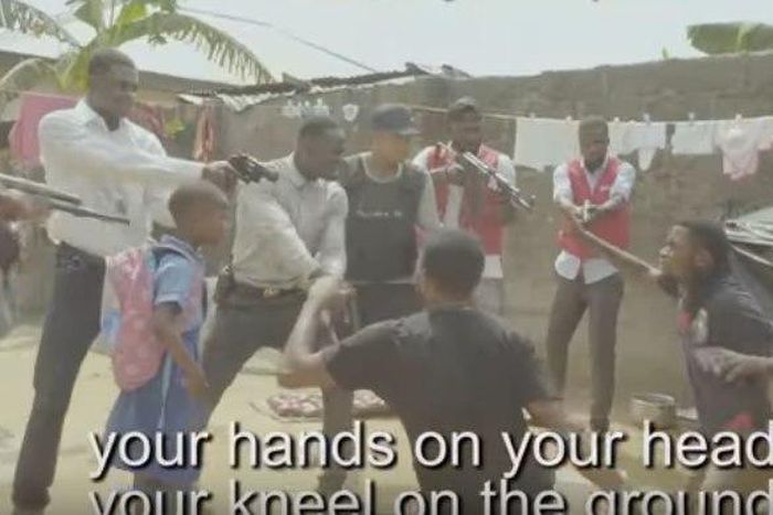 Emmanuella and a bunch of police guys