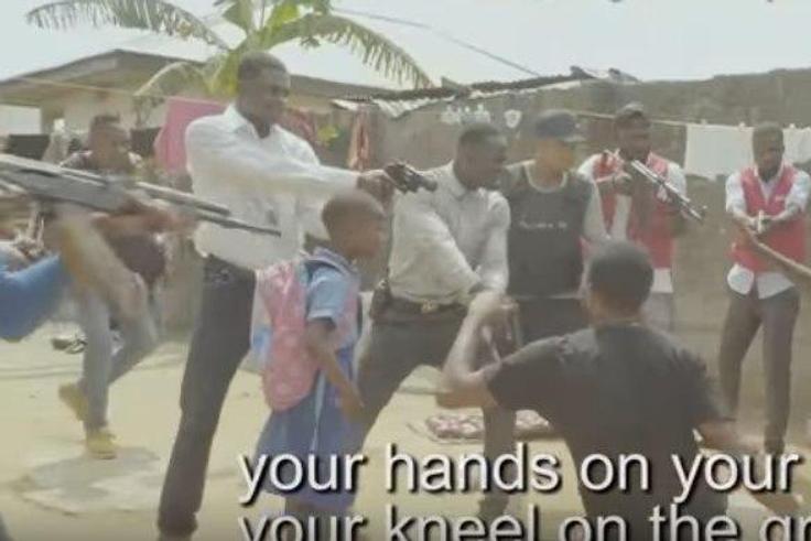 Emmanuella and a bunch of police guys