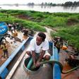Truck drivers collect water directly from the Nile river to distribute to residents in Juba, South Sudan