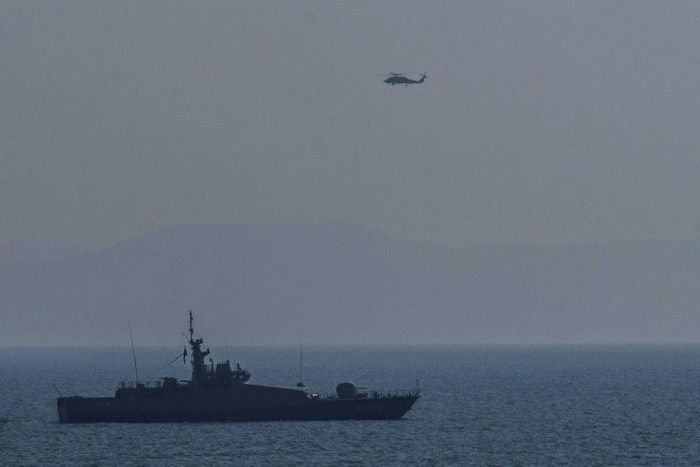 A Turkish warship patrols the Aegean Sea close to the Greek island of Lesbos in 2016