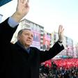 This handout picture released by the Turkish Presidential Press Service on February 17, 2017 shows Turkish President Recep Tayyip Erdogan greeting the audience during a rally