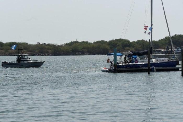 An army boat approaches the "abortion ship" of the Dutch organization Women on Waves at the Pez Vela Marina in the port of San Jose, Escuintla department, 120 km south of Guatemala City, on February 23, 2017