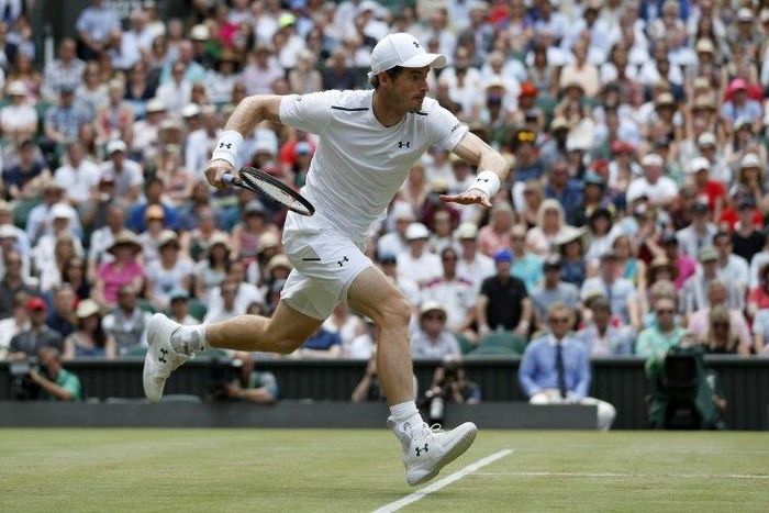 Britain's Andy Murray runs to return to France's Benoit Paire at Wimbledon on July 10, 2017