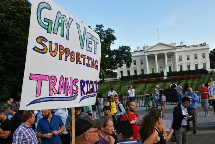 Protesters gather in front of the White House in Washington, DC in July against President Donald Trump's plan to ban transgender people from serving in the military