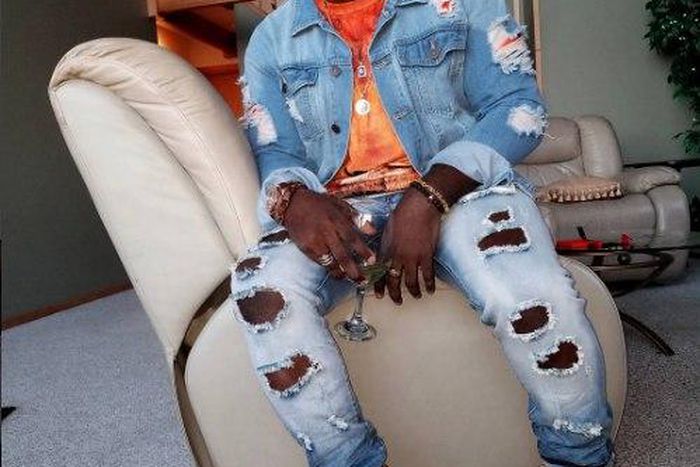 Jim Iyke in ripped denim