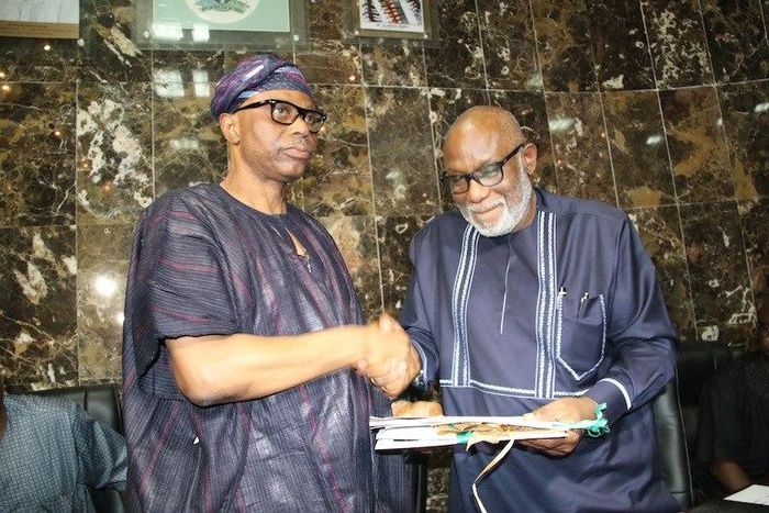 Olusegun Mimiko (L) and Rotimi Akeredolu (R)